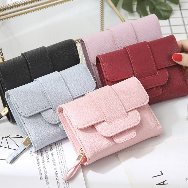 2022 new women's short wallet Korean version fashion lychee pattern wallet student three-fold cute coin purse wholesale