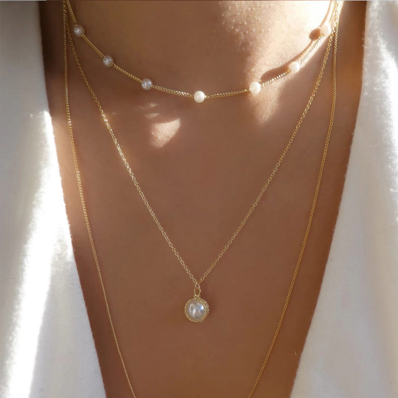 2023 new cross-border jewelry simple pearl clavicle chain women's fashion versatile alloy multi-layer necklace wholesale