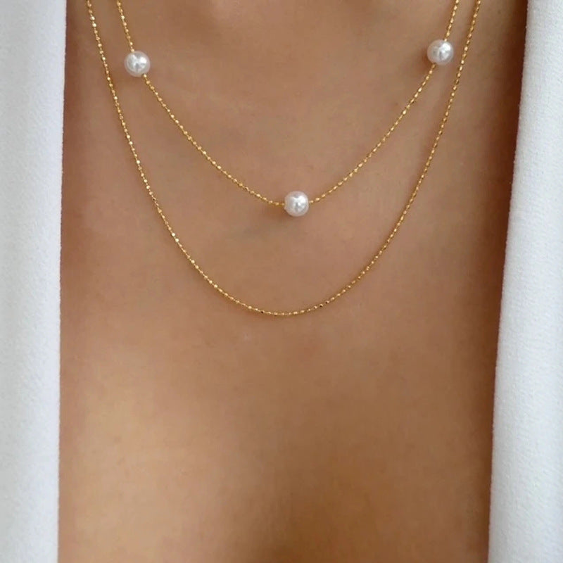 2023 new cross-border jewelry simple pearl clavicle chain women's fashion versatile alloy multi-layer necklace wholesale