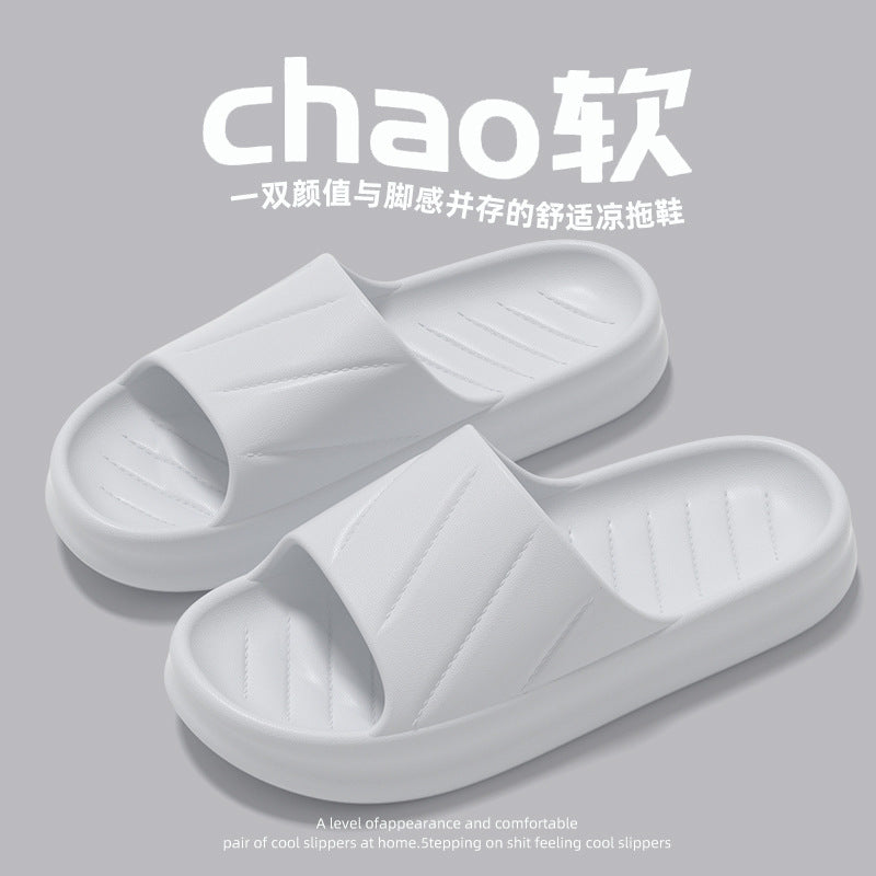 Wholesale summer slippers men's home indoor women's home thick bottom non-slip soft home bathroom couple stepping shit feeling slippers