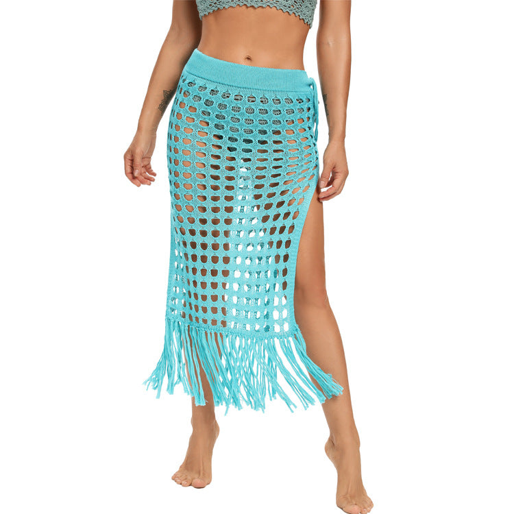 2020 spring and summer new European and American women's clothing sexy see-through hollow knitted skirt slit fringed beach skirt