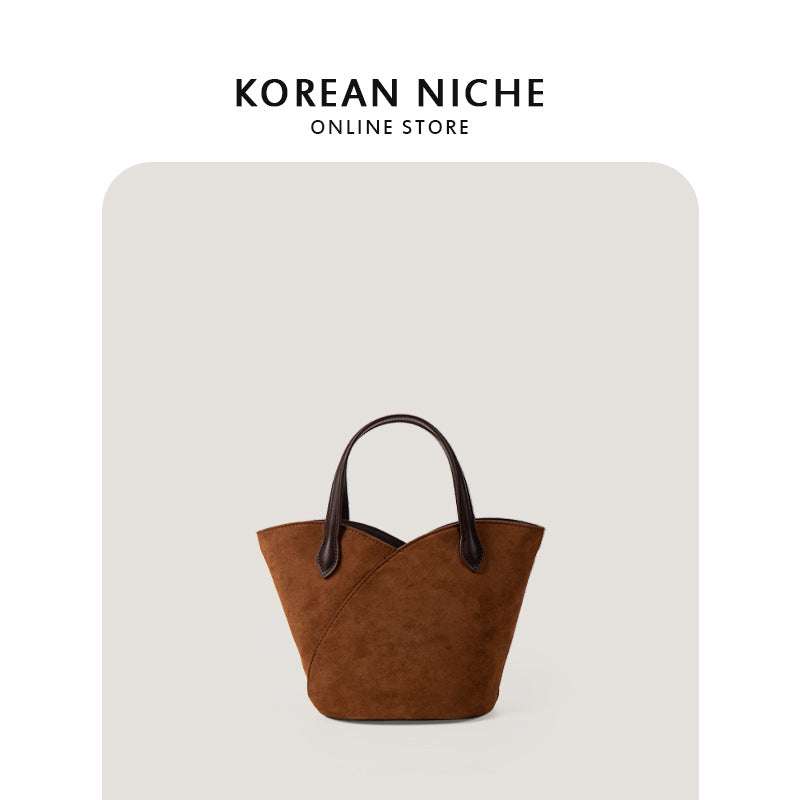 2023 new Korean version of the niche cross-border trade retro suede handbag female casual all-match basket bag