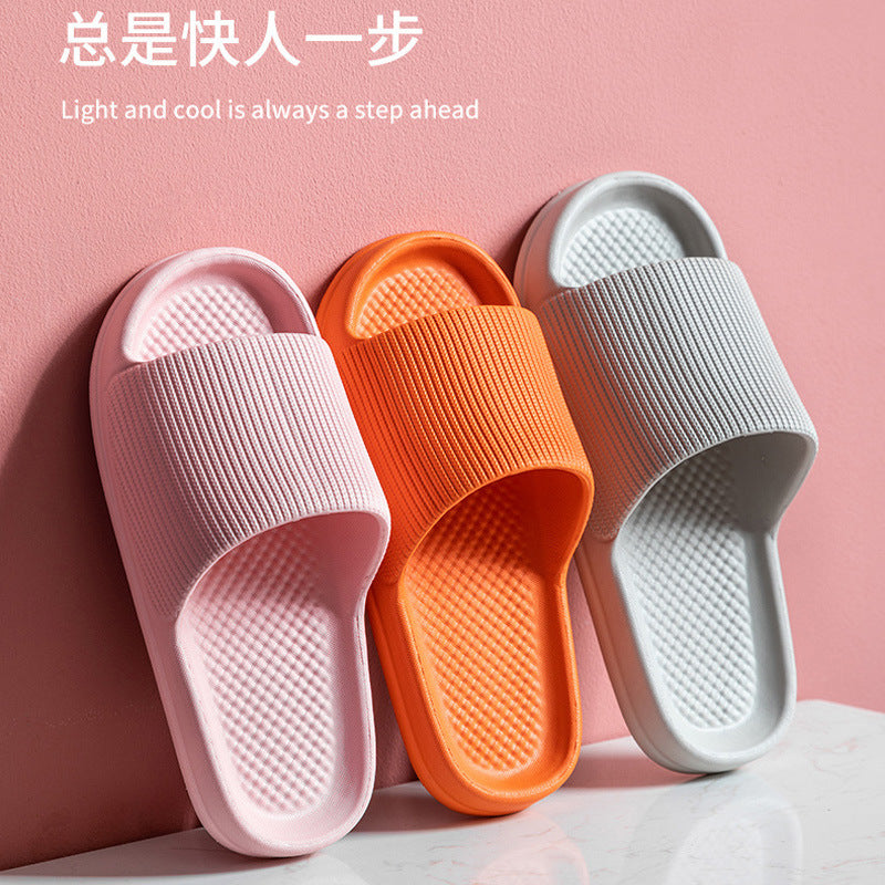 Wholesale summer slippers men's home indoor women's home thick bottom non-slip soft home bathroom couple stepping shit feeling slippers