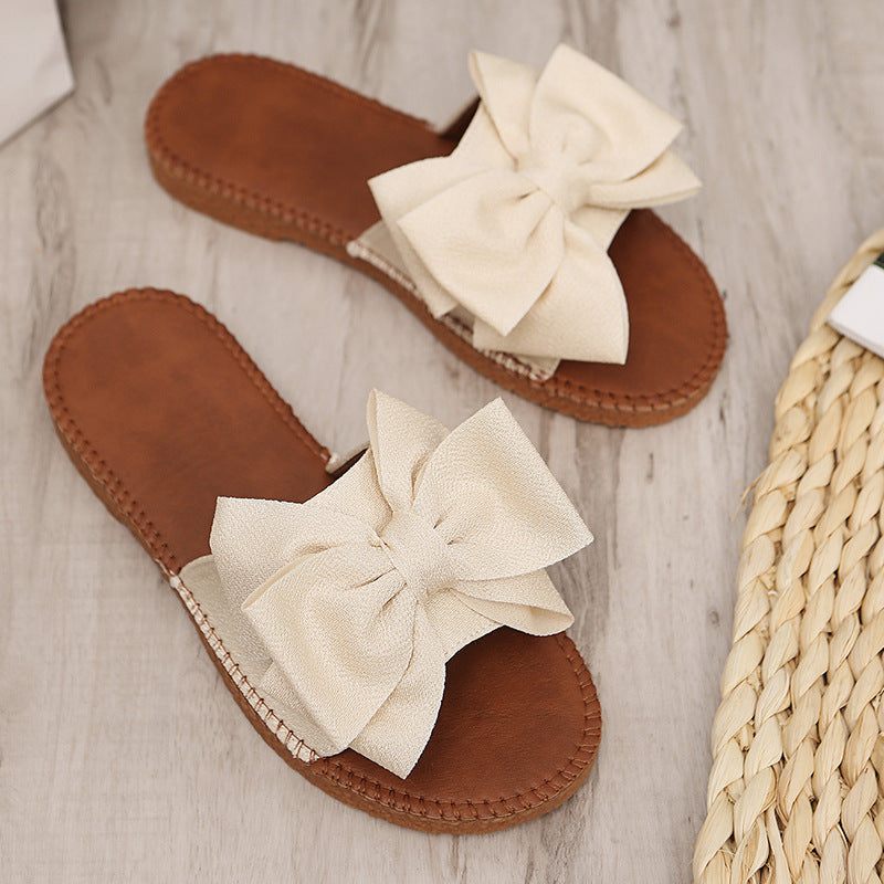 2023 new thick-soled sandals and slippers women wear bowknot non-slip indoor cute muffin beach word summer